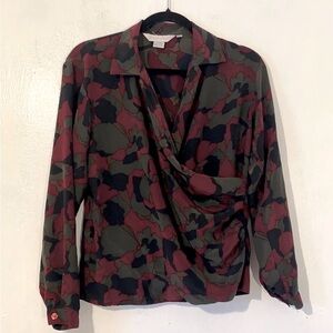 100%Silk Vtg.Paula Saker Green and black abstract print wrap style blouse.Size 6